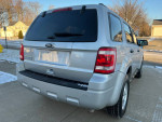 2012 Ford Escape XLT FWD parked, showcasing clean exterior and rear view in good condition.