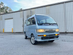 Daihatsu MicroVan in light blue with fog lights, parked at Coastal Classic Cars, showcasing its automatic transmission and reliability.