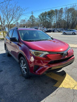 2018 Toyota RAV4 in red, 137,000 miles, available for sale, runs and drives well
