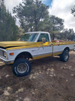 1972 Chevrolet K10 classic truck with original 4x4, yellow and white, in a natural setting