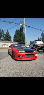 1989 Nissan Skyline GTS-T Type M in red, garage kept, in great condition with aftermarket mods and low mileage.