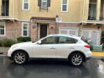 2008 Infiniti EX35 Journey SUV in excellent condition parked outside a residential building