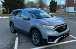 2021 Honda CRV EX in silver, all-wheel drive, clean with 19K miles, parked outdoors.