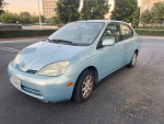 2001 Toyota Prius in clean condition with 136,000 miles, reliable and fuel-efficient compact car.