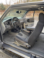Interior view of a 2007 Mazda B4000 with modern features and clean upholstery.