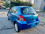 2007 Toyota Yaris hatchback in excellent condition with low mileage parked on street