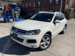 2012 Volkswagen Touareg Lux V6 AWD in excellent condition, available for sale with 90,000 miles.