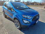 2020 Ford EcoSport SES in blue color parked, showcasing its sporty design and compact SUV features.