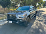 2021 Toyota Tacoma SR5 4WD in excellent condition with clean interior and new tires, ready for sale.