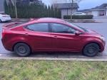 2012 Hyundai Elantra, clean condition, winter tires, parked on the street