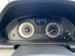 Dashboard of a 2014 Honda Odyssey EX with mileage, speedometer, and fuel indicators