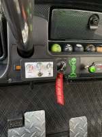 Club Car Precedent golf cart control panel with speed and acceleration settings.
