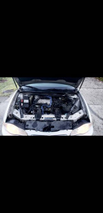 Engine view of a 2003 Chevrolet Monte Carlo for sale, highlighting recent repairs and maintenance.