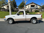 1996 Ford Ranger single cab 4x2 in great condition, white truck parked on the street.