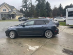2009 Mazdaspeed 3 in excellent condition with modifications, parked in a residential area.