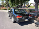 1997 Nissan Maxima parked on street, featuring new tires, brakes, and strong V6 engine.
