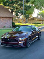 2018 Ford Mustang EcoBoost in perfect condition with 59,000 miles parked outdoors