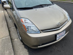 2007 Toyota Prius in great condition with leather seats, parked on the street.