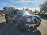 2013 GMC Sierra crew cab 4x4 with 162K miles, V8 engine, recently painted, available for sale at $13,900.