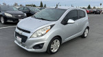 2013 Chevrolet Spark in silver with 124,000 miles, featuring a sleek design and clean title.