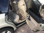 Interior view of a 2007 Subaru Outback, showcasing spacious seating and clean upholstery.