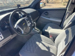 Interior view of a 2007 Chevrolet Equinox LS with a clean cloth interior and modern controls