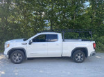 2022 GMC 1500 Sierra 4x4 extended cab truck with roof rack, white color and brand new tires