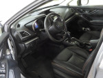 Interior view of a 2019 Subaru Crosstrek, showcasing black leather seats and dashboard features.