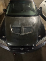 1998 Honda Accord LX with a carbon fiber hood and new intake, parked indoors.