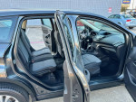 Interior of 2017 Ford Escape S FWD showing spacious back seats and modern dashboard.